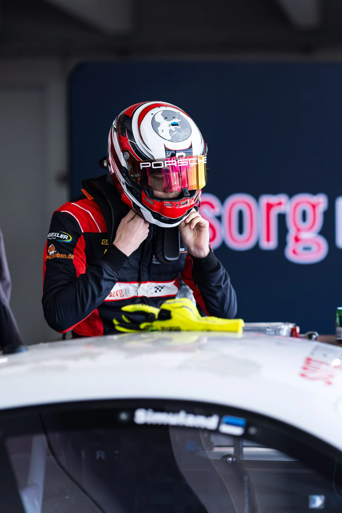 Ragnar Simuland adjusting his helmet