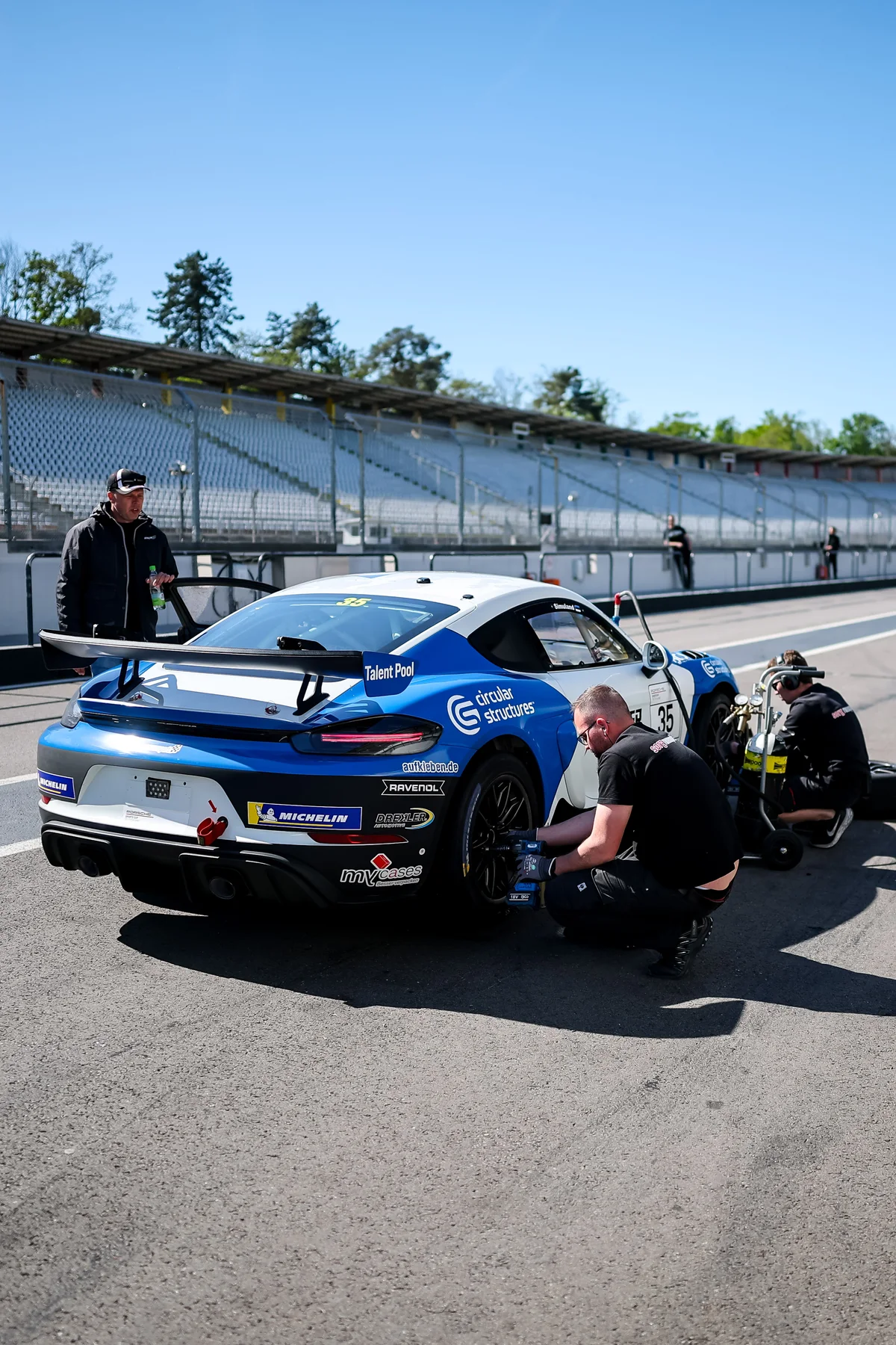 Sorg Rennsport Porsche GT4 in the pit lane